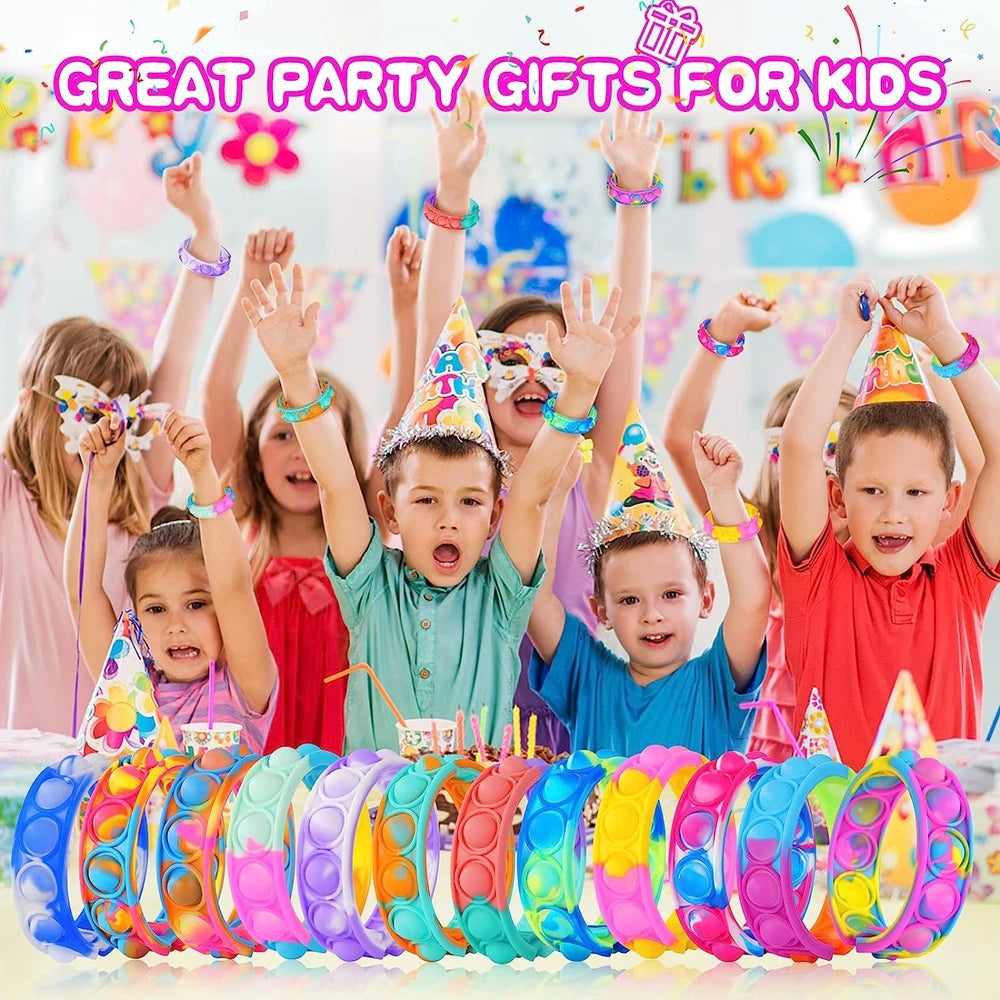 Children at a birthday party with colorful bubble toys and party hats.