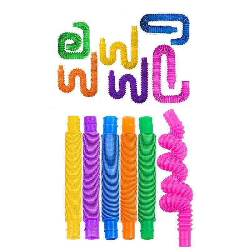 Set of colorful flexible tubes on a white background
