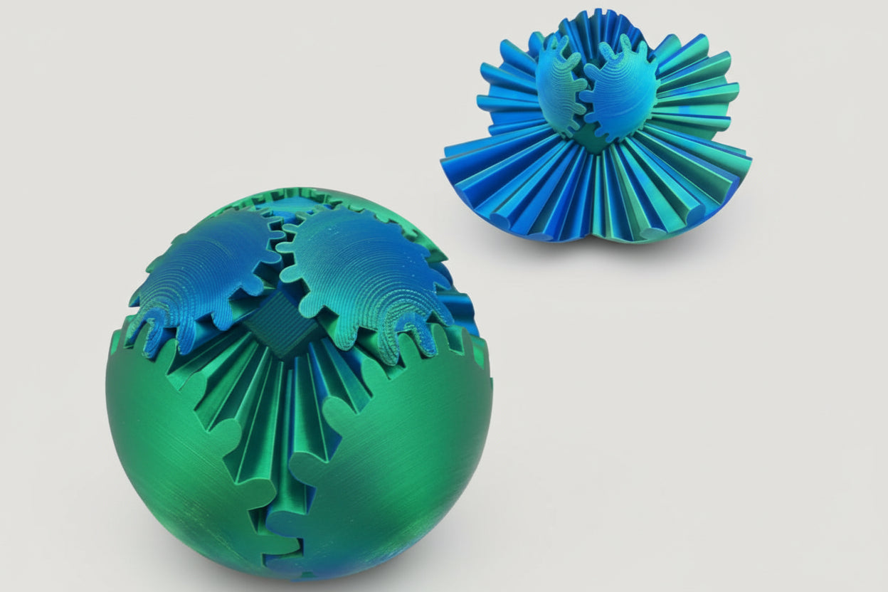 Two blue and green textured 3D Fidget Spinner on a white background