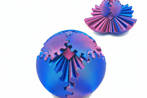 Blue and pink 3D printed gear sphere fidget spinners designed for sensory play, stress relief, and focus support for kids and adults.”