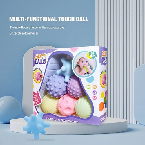 Box of Soft Balls toy with colorful balls on a blue background