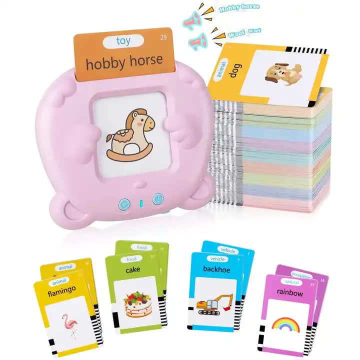 Bear-shaped early education card reader in pink color with a set of colorful flashcards. The product is designed to read out words from the flashcards and has a slot on the top for inserting cards.