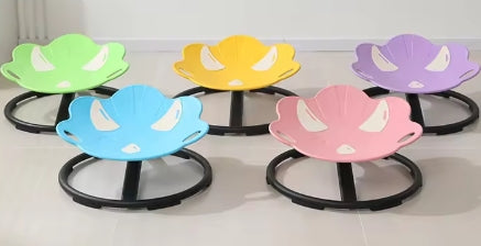 Set of colorful children's chairs with black bases on a white background