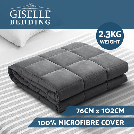 Gray weighted blanket with Giselle Bedding branding on a striped bed background