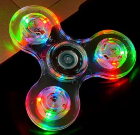 Colorful LED spinner on a dark surface