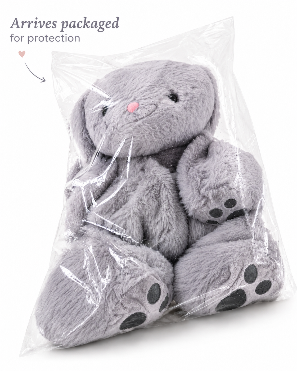 Gray plush bunny in clear packaging with text 'Arrives packaged for protection'.