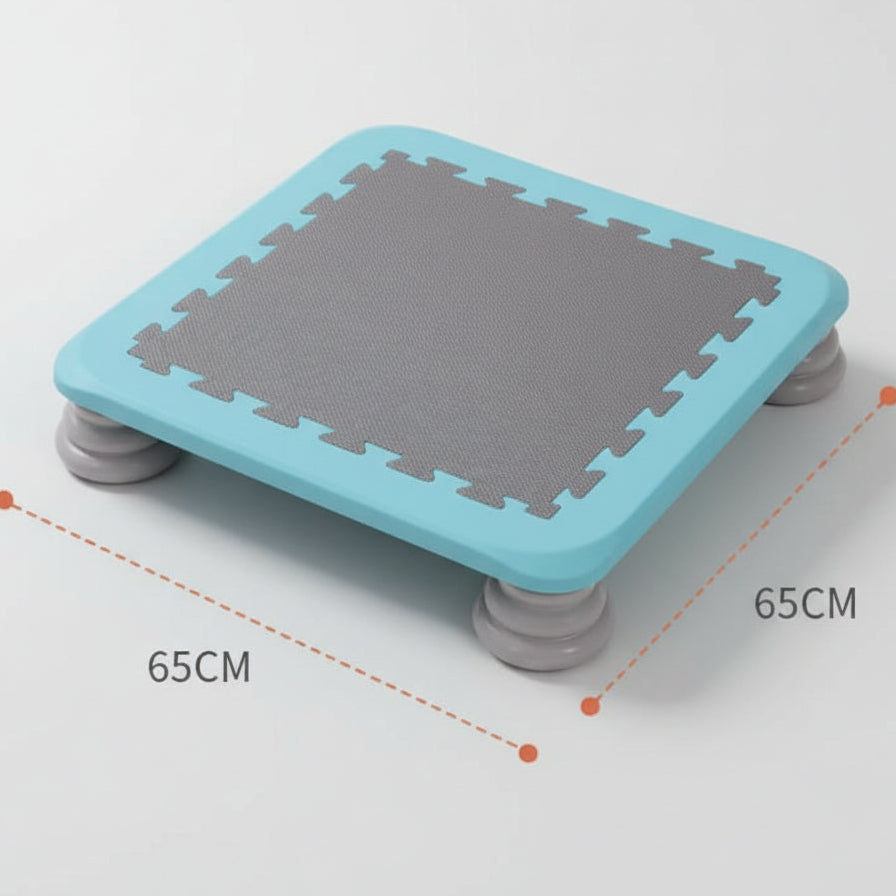 Blue mini kids’ sensory trampoline with a grey jumping surface and sturdy grey legs, measuring 65cm by 65cm, designed for balance training, sensory play, and gross motor development.