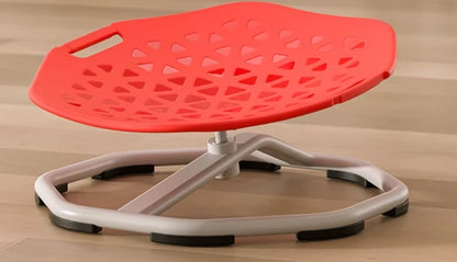 Red and gray sit-stand chair on a wooden floor