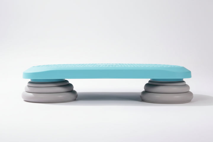 Side view of Blue Kids Sensory Mini Bounce Board showing the low-profile design and grey non-slip feet