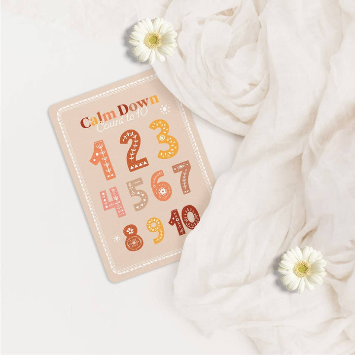 Card with numbers and 'Calm Down' text on a white background with flowers
