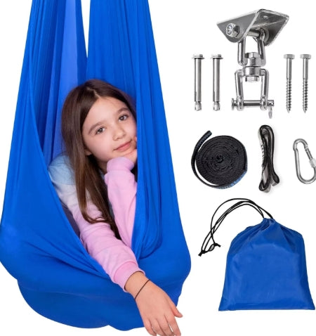 Child relaxing in a blue sensory hammock swing, promoting focus, emotional regulation and calm