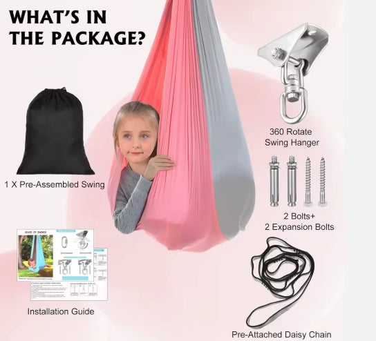 Child sitting in a pink/grey sensory hammock swing chair, providing calming vestibular input for ADHD